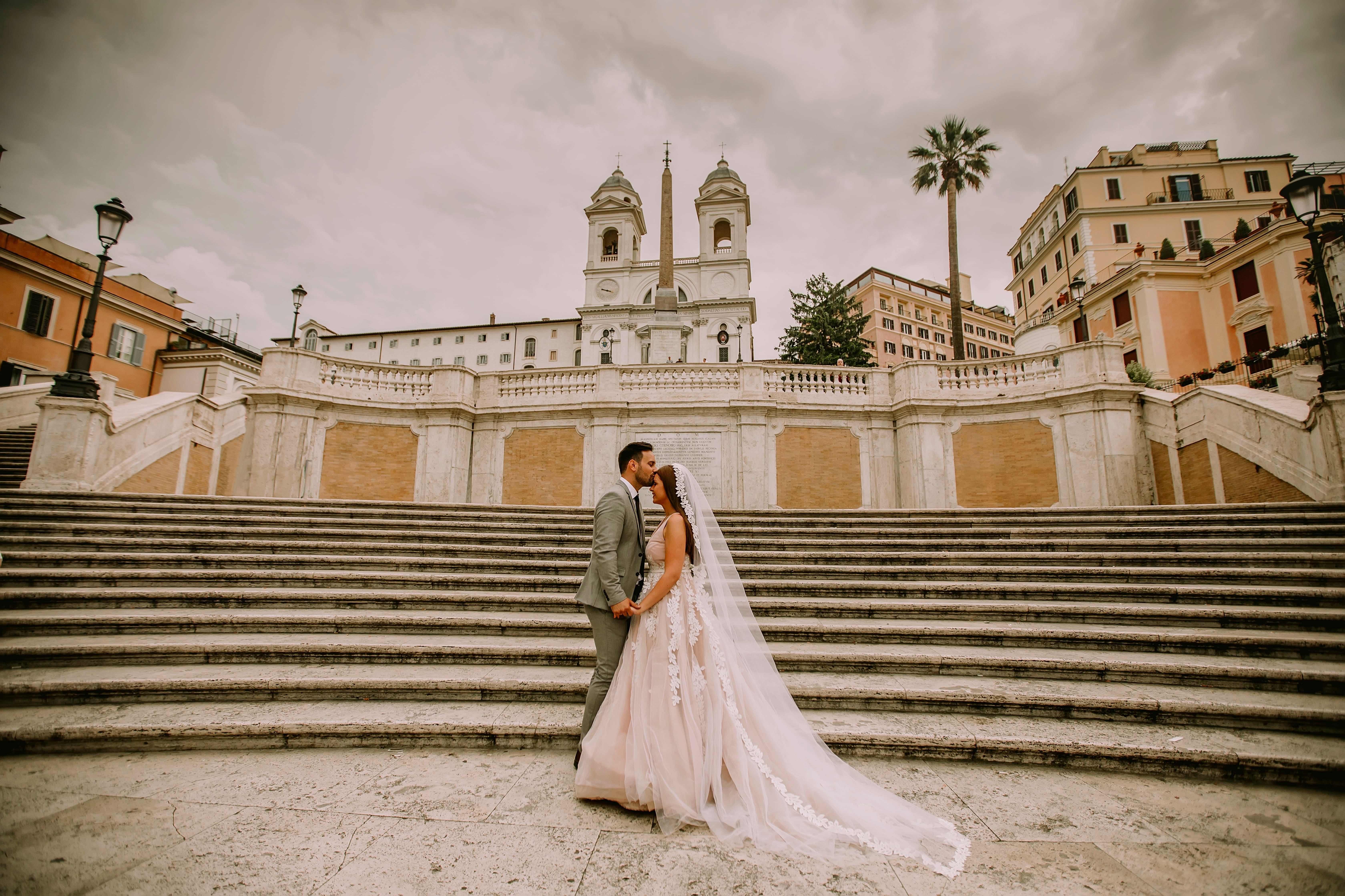 Young wedding couple on the Spanish Steps in Rome