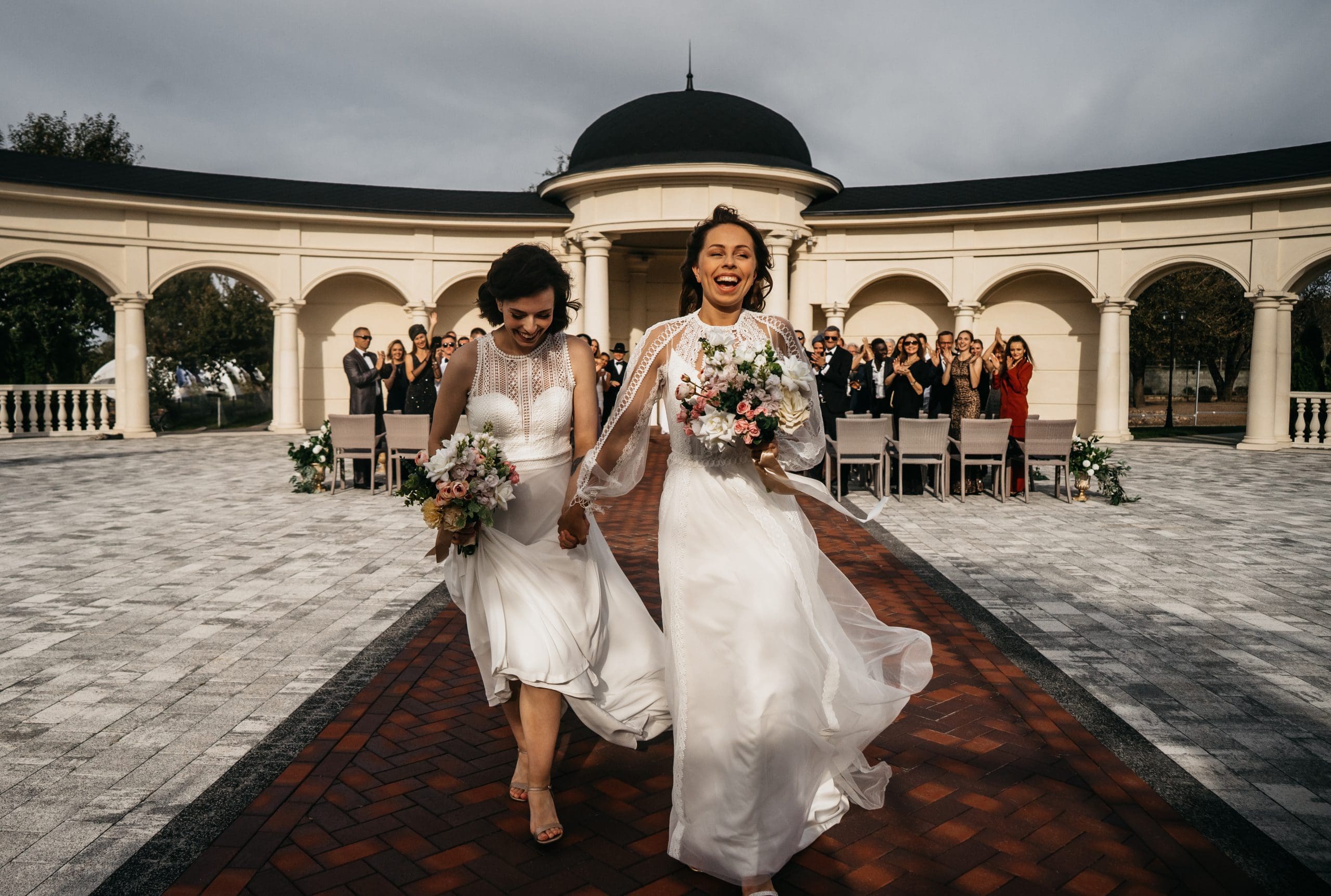 Same-sex wedding couple walking after their ceremony